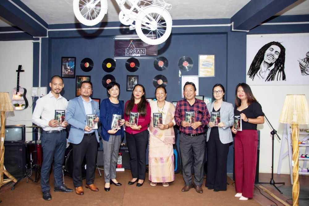 Oshyajem Longkumer (fourth from left) along with family members and others after the book launching program.